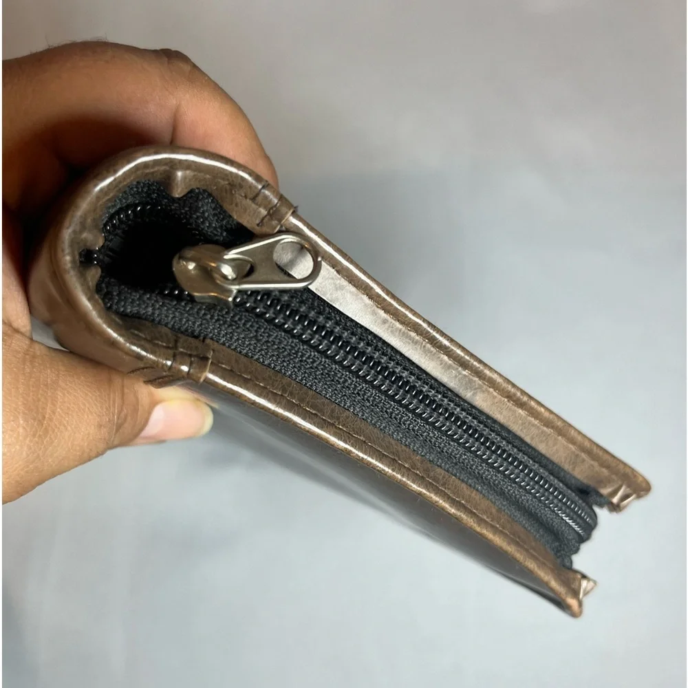 Day Timer Brown Folder With Some Papers